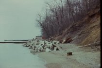 Remnants of long concrete pier on central beach